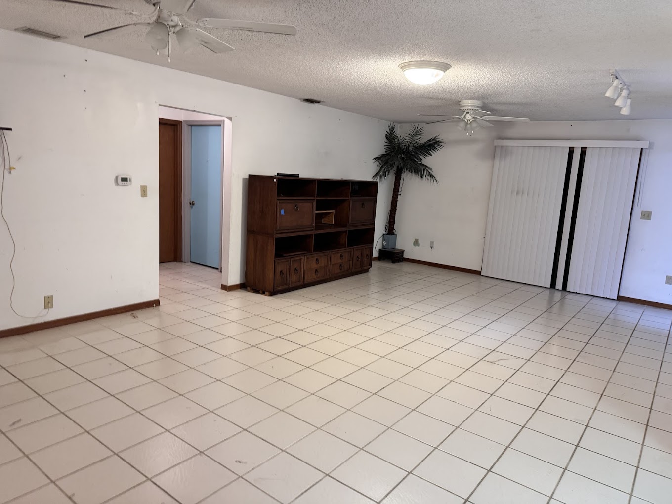 House interior, cleared of most furniture